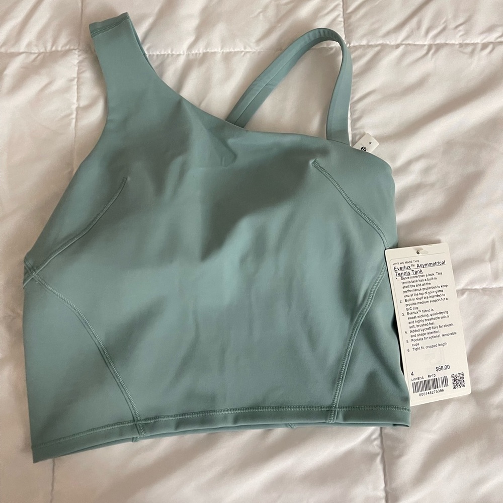 Brand new Lululemon Everlux Asymmetrical Tennis Tank Size 4
